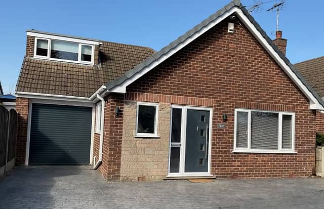 The three-bedroom family home on Peafield Lane, in Mansfield Woodhouse, has a driveway and tandem double garage