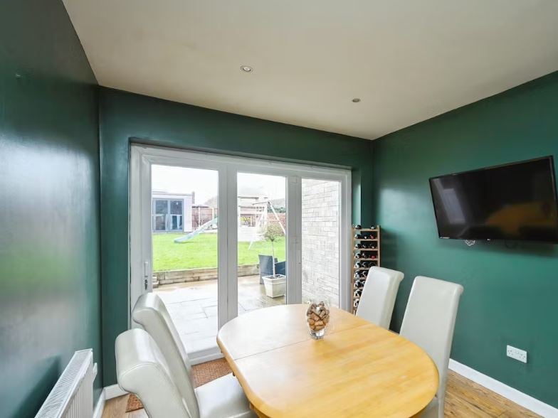 The dining room looks out onto the garden