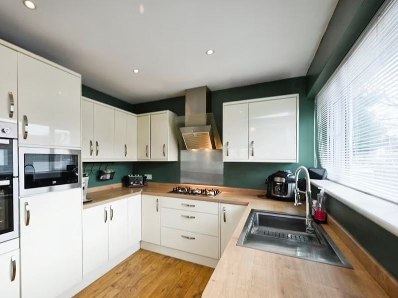 The house boasts an impressive modern kitchen
