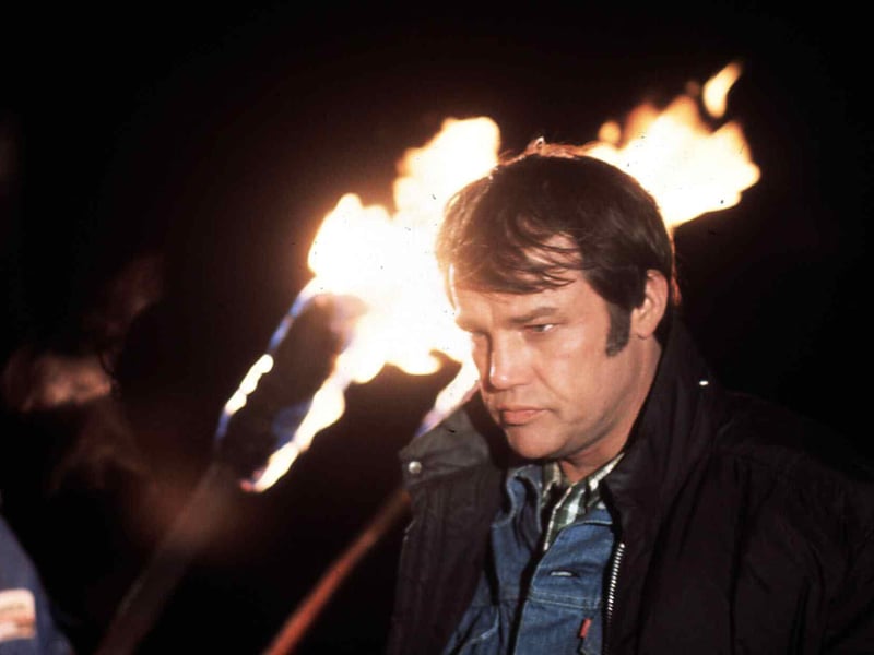 Joe Don Baker, best known for his iconic role as Buford Pusser in Walking Tall, died at the age of 89. The star also carved out a unique spot in the James Bond franchise, playing two different characters. In The Living Daylights (1987), he portrayed arms dealer Brad Whitaker. Later, he returned as CIA agent Jack Wade in GoldenEye (1995) and again in Tomorrow Never Dies (1997), acting as Bond’s laid-back American contact.