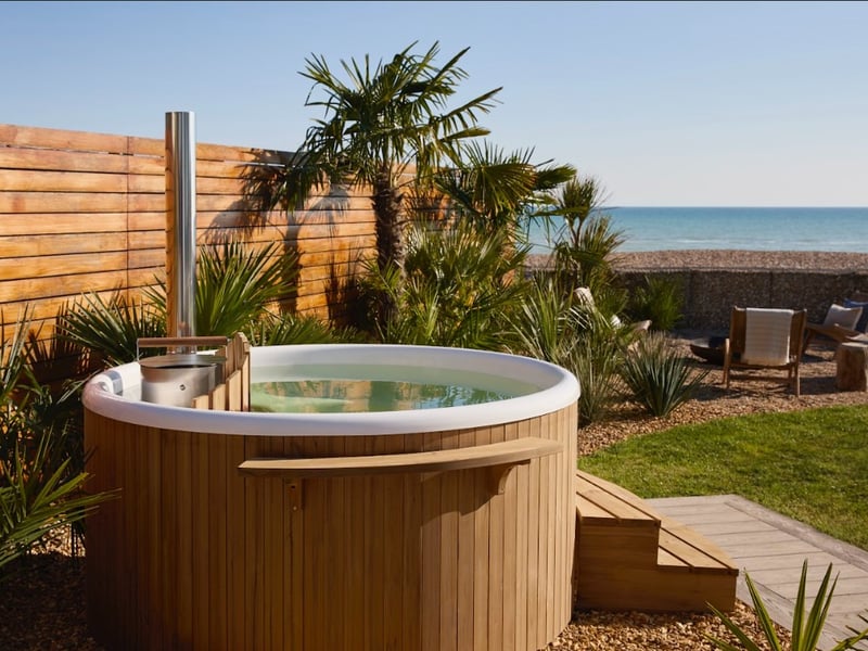 You can take in the views from the hot tub at this £4m beachside villa, which is up for grabs in the latest Omaze prize draw