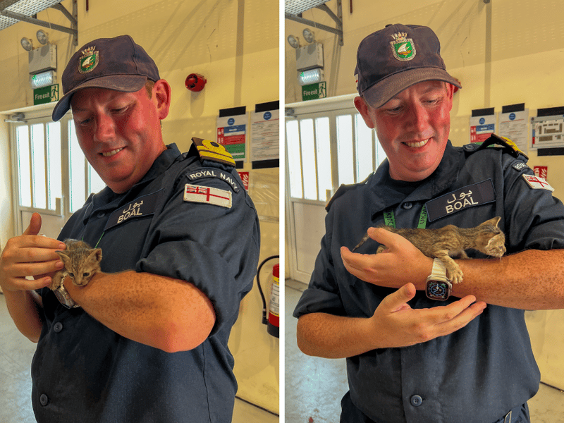 Lt Nathan Boal holding one of the kittens.