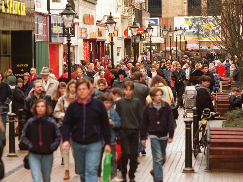 Shoppers crowd the streets of Harrogate in search of sales bargains in December 1994.