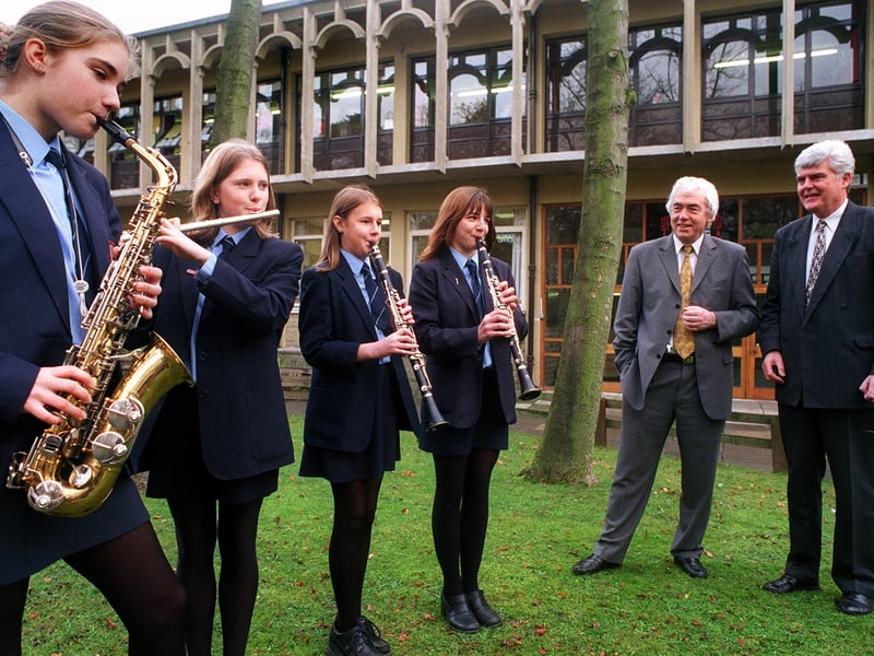 St John Fisher RC High School was celebrating specialist art school status in November 1999. Pupils entertain Phil Willis, left, MP for Harrogate & Knaresborough, and their head teacher Terry Keelan. They are, from left, Rachel Perry, Lindsay Crack, Katharine Lawley and Emily Wise.