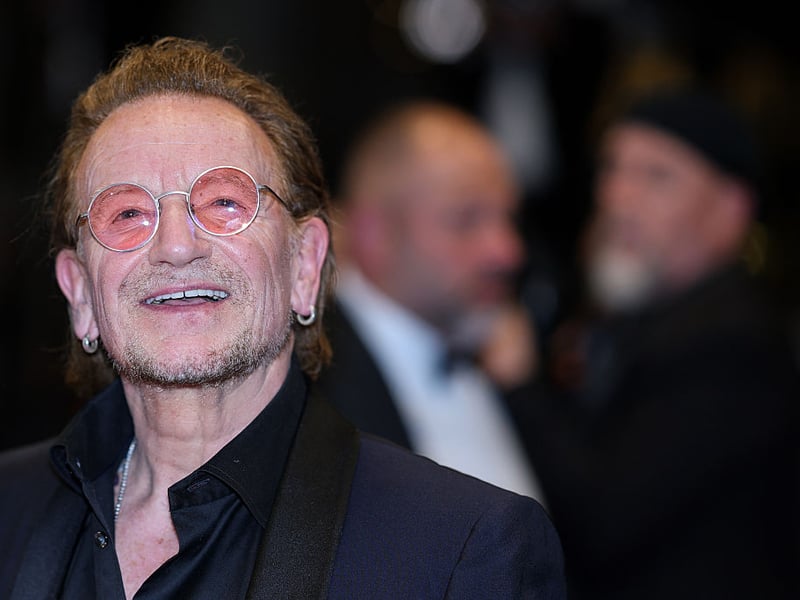 U2 lead singer Bono leaves after the screening of the film 'Bono: Stories of Surrender'.
