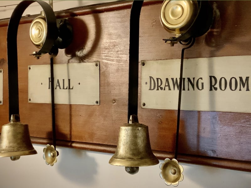 Internally, the residence retains an abundance of period detail including original wood panelling, ornate fireplaces, a carved stone mantel, restored servant bells, and William Morris wallpapers.