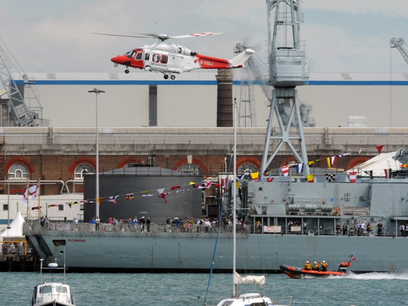 Navy Days 2010 at the Portsmouth Naval Base. Pictured is the Coastguard Helicopter display over HMS Richmond