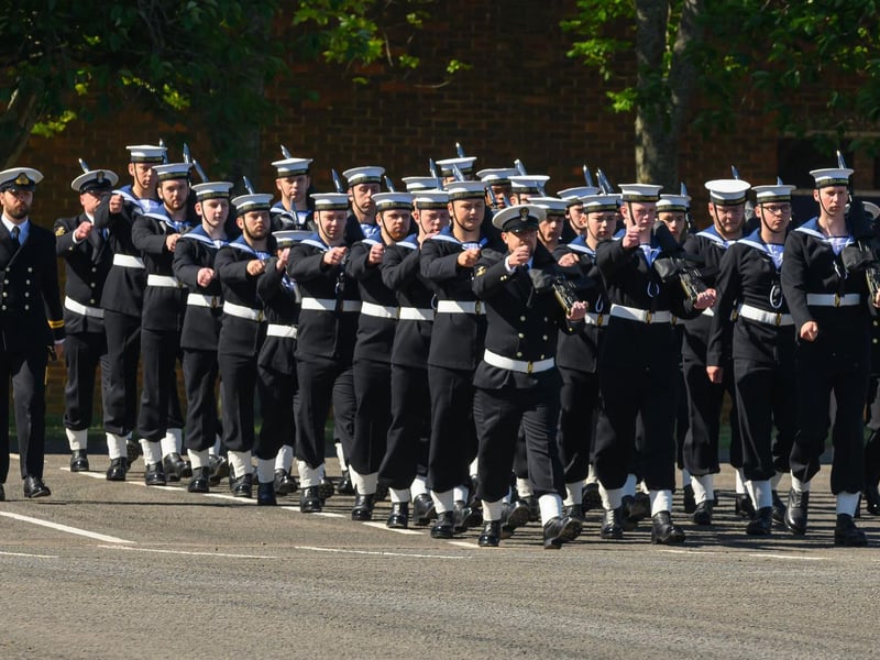 A parade marching at HMS Collingwood during the visit of the Rear Admiral.