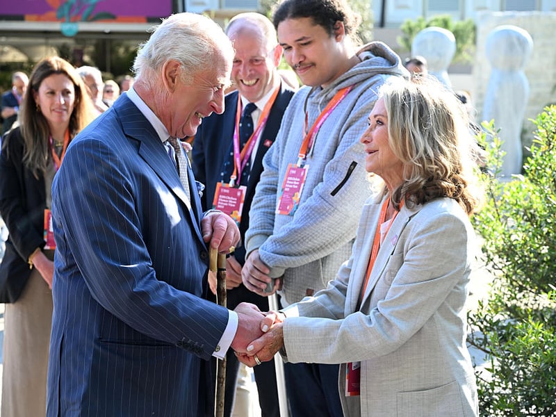 King Charles III greets actress Felicity Kendal.