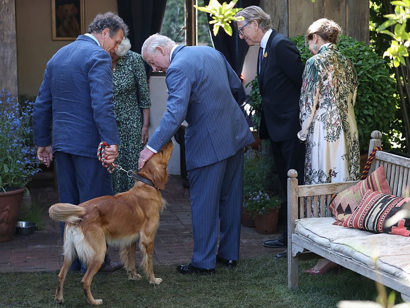 King Charles III meets BBC broadcaster Monty Don and his dog Ned.