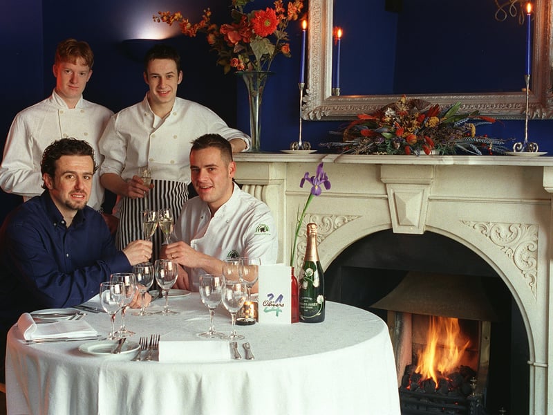 Inside Olivers 24 restaurant in December 1998. Pictured are proprietor Sandy Greetham (seated left) with head chef Jamie Dilasser (seated right) and new chefs Malcolm Bell and Daniel Parry.