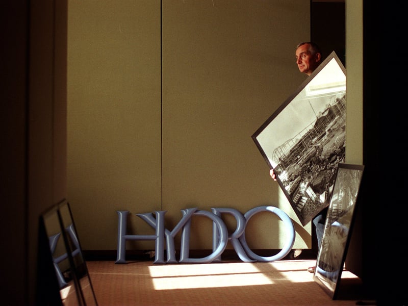 Photographer Peter Mitchell arranging his new exhibition on the construction of Harrogate's Hydro swimming pool at the town's Mercer Gallery. Pictured in September 1999.