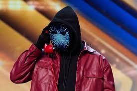 In his audition mysterious magician The Hacker took over Simon Cowell's seat and get the judge to perform a trick. The semi-finalist is 50/1 to go on and win.