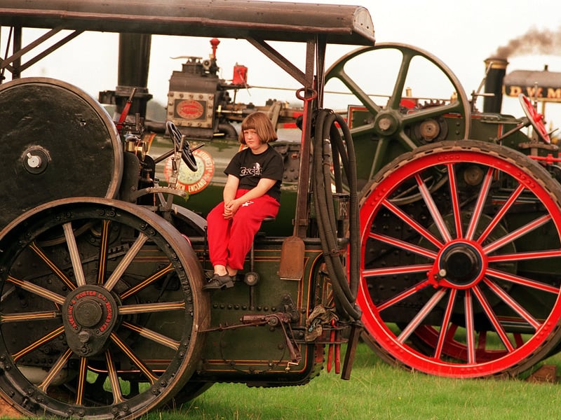 Sitting on her grandfathers 1929 Steam Roller by Aveling and Porter owned by the Carr Brothers from Sheffield at the Harrogate Steam Fair is Emily Mettam. Pictured in August 1999.