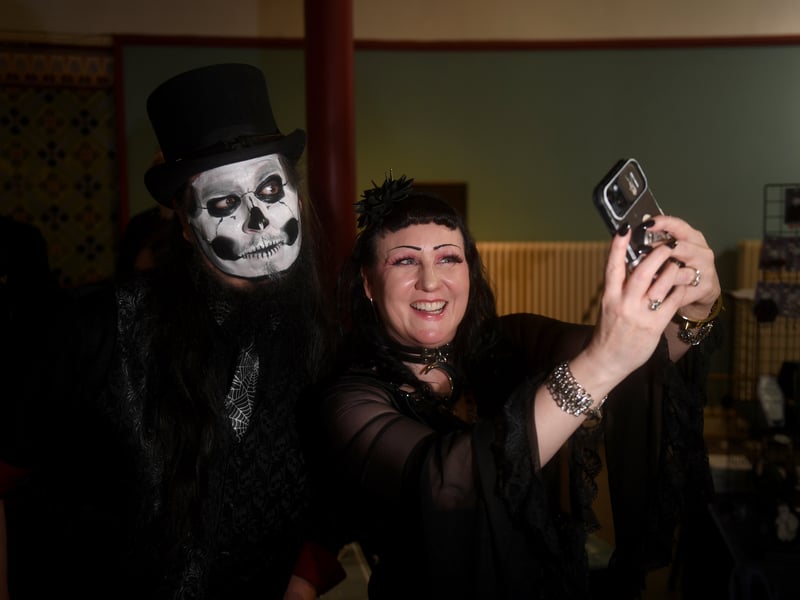 A visitor takes a selfie.