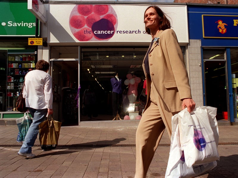 Dr Stephanie Wright, right, a lecturer in Biochemistry and Molecular Biology at Leeds University, after a spot of shopping at the new Cancer Research Campaign charity shop that she opened in April 1999.