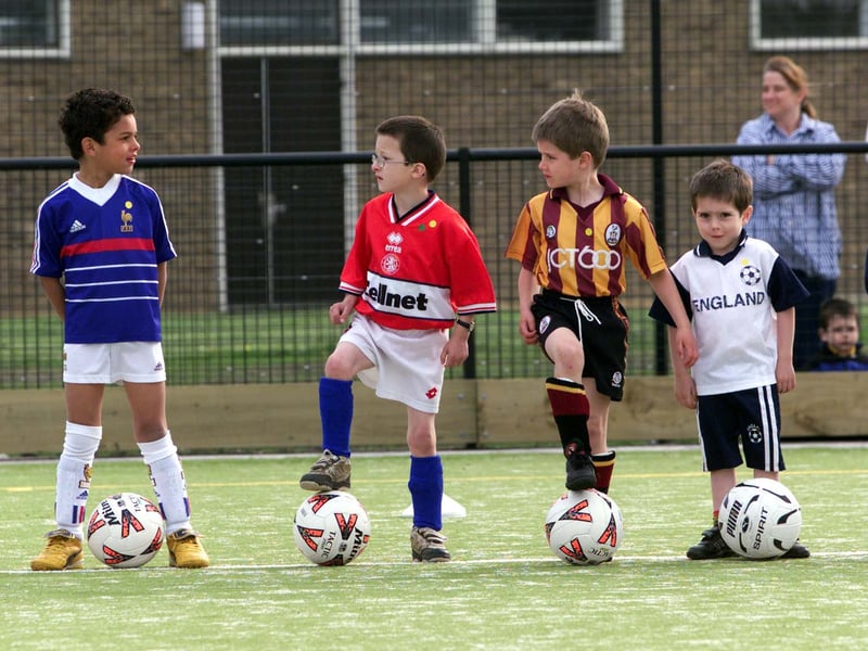 Young budding football stars try out the new astro turf pitch at Granby High School during the start of a new 10 week football club course run by the local council. Pictured in May 1999.