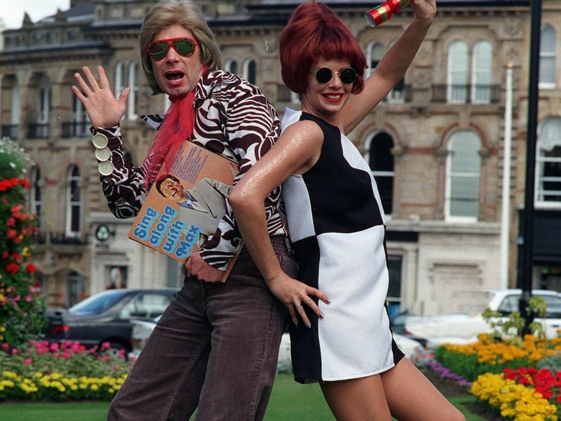 Tony Travino from Funky Doodys and Mags Sewards of Principal Hotels 'Boogie on Down' outside the Imperial Hotelto launch its Christmas party package in August 1998.