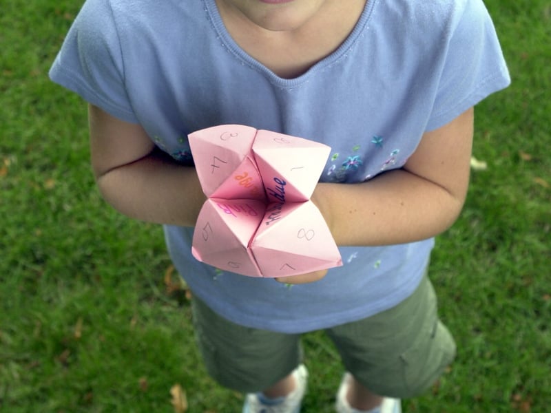 This was the limit of most children's origami skills back in the 1970s, but it was a great way to impress your mates in the playground. The paper fortune teller was labelled with colours or numbers and would be opened and closed according to the player's choices before revealing the hidden message inside one of the eight flaps. That message was often the answer to a question or sometimes a dare for the player to complete.