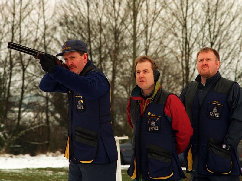 Members of the West Yorkshire Police Clay Pigeon Shooting Team pictured at Knaresborough Gun Club in March 1996. Taking aim is Nigel Hirst watched by Mark Hunter, right, and Andy Booth.