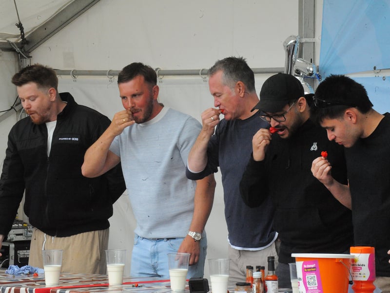 Contestants brave the chilli eating contest.