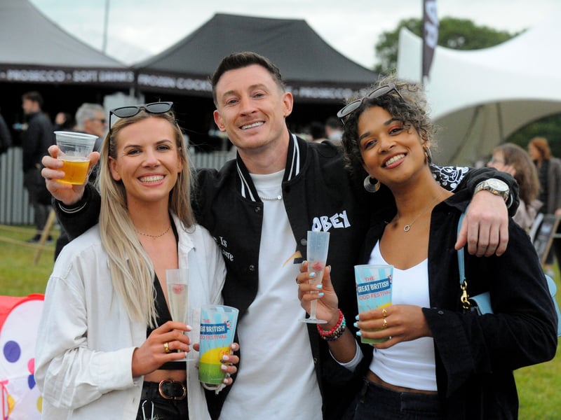Ellie Bradford, Sam Gill and Isel Latif of Leeds relaxing at the festival celebrating Sam's birthday.