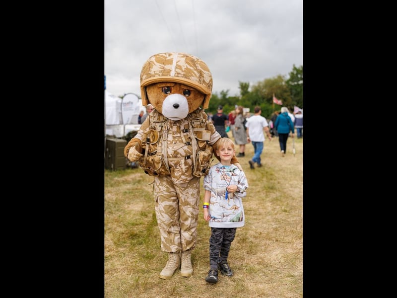 Pictured: Walter taking picture with the military mascot 
Picture: Marcin Jedrysiak