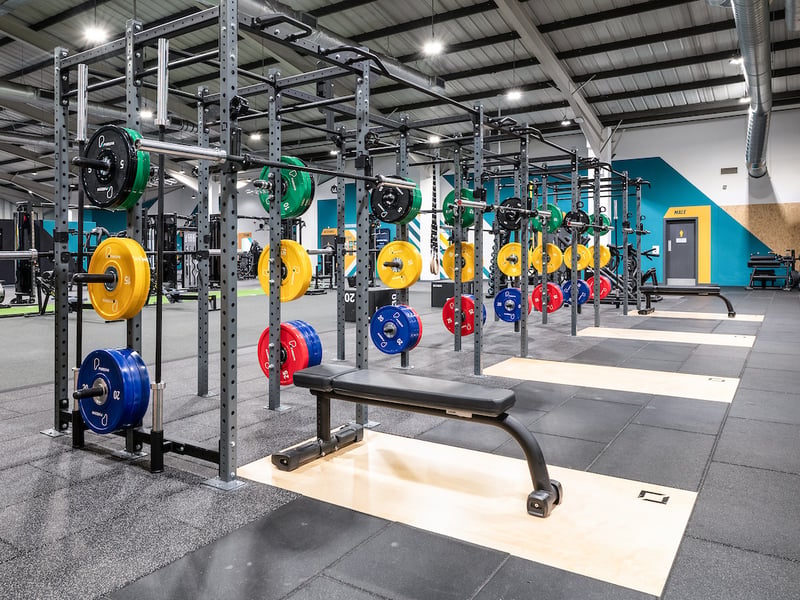 The refurbishment includes an extended and upgraded free weights area, now featuring an 8-bay rig along with new dumbbells and barbells.