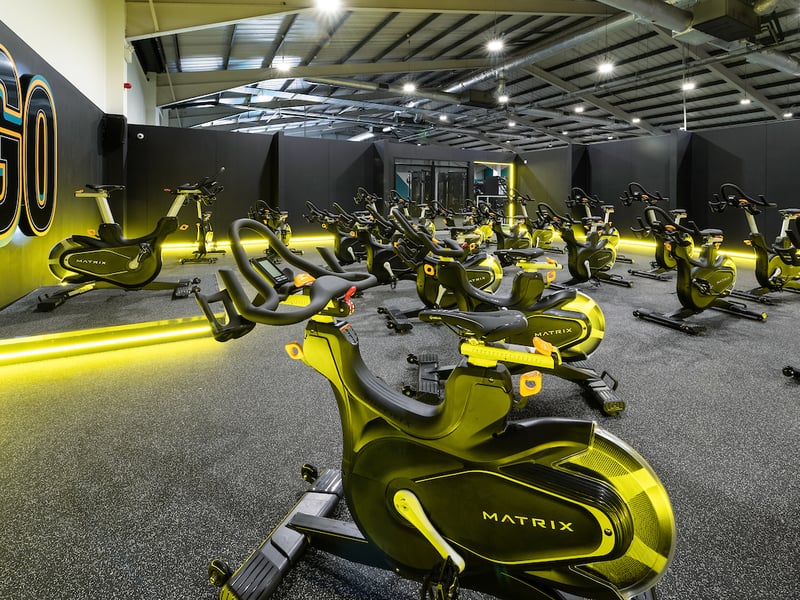 Refurbished cycle studio featuring brand new bikes.
