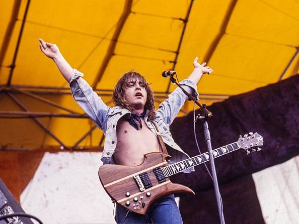 Rock music icon and guitarist Rick Derringer, known for 'Real American', died at 77 after sudden heart failure. He is pictured performing in 1977. (Photo by Ed Perlstein/Redferns/Getty Images)