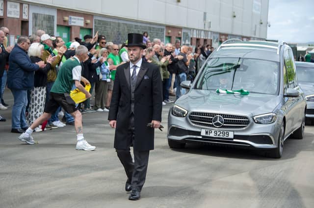 Hibs fans applauded as the hearse made its was through the stadium.