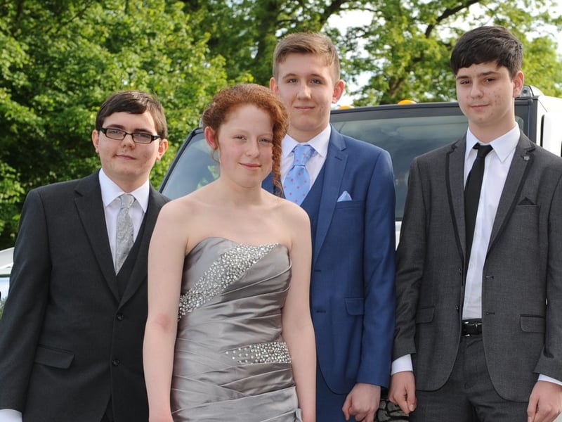 A stretch limousine was the transport of choice for these students who were pictured just after arriving at their prom.