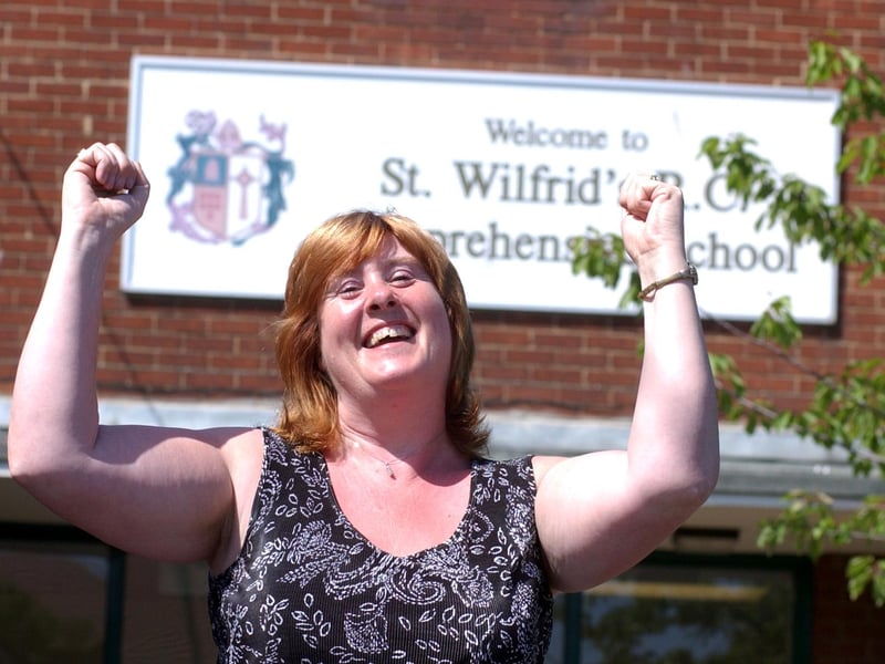 Math head teacher Christine Wright was celebrating a special status for the school when she was photographed at St Wilfrid's School in June 2005.
