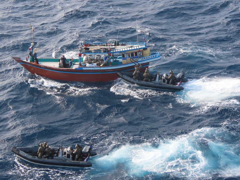 HMS Lancaster seized £30m worth of narcotics during a major drugs bust in the Arabian Sea. Pictured: Royal Marines of 42 Commando boarding the suspect vessel.