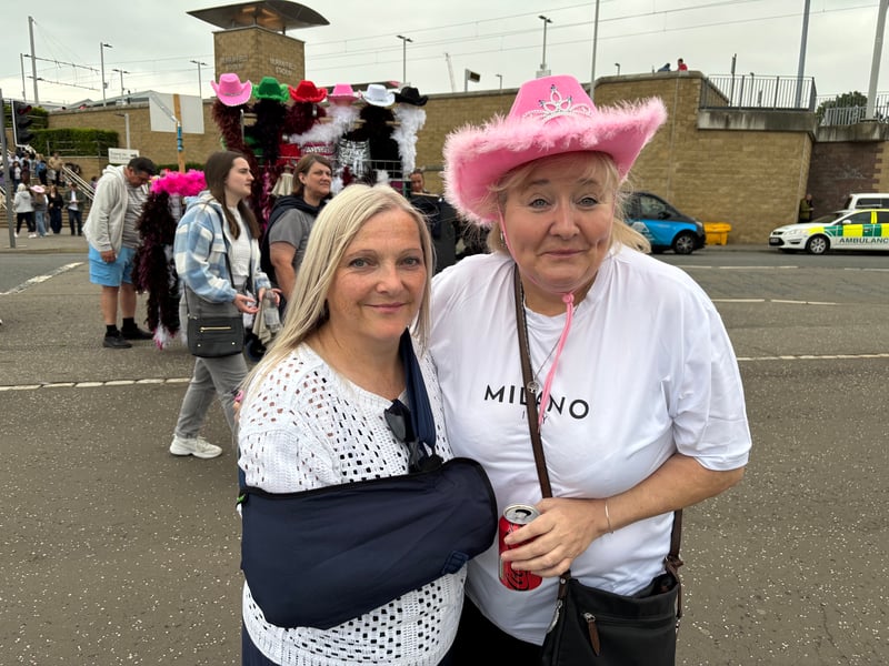 From Berwick-upon-Tweed and Glasgow, these two both say they have been fans of Robbie's "since day one" - but not Take That.  Their favourite songs are Road to Mandalay and Angels.  