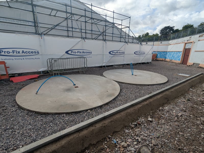 Concrete bases have been installed at the shower units at the western end of the site. 

