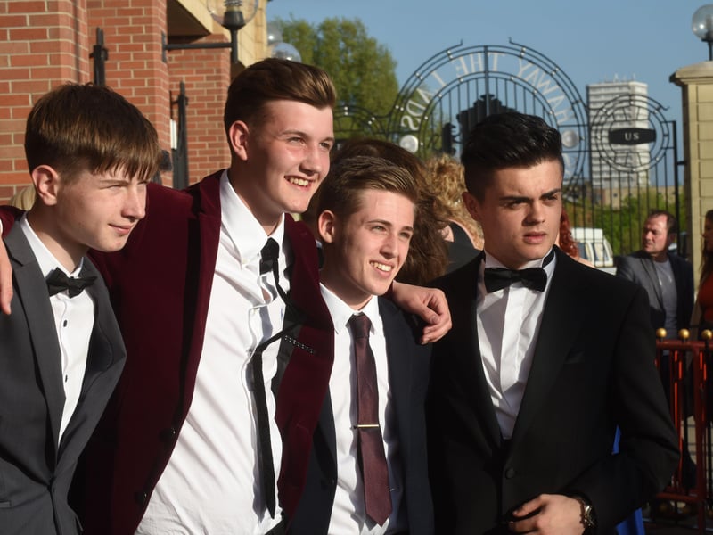 Four friends who took time to get this photo memory of their prom night at the Stadium of Light.