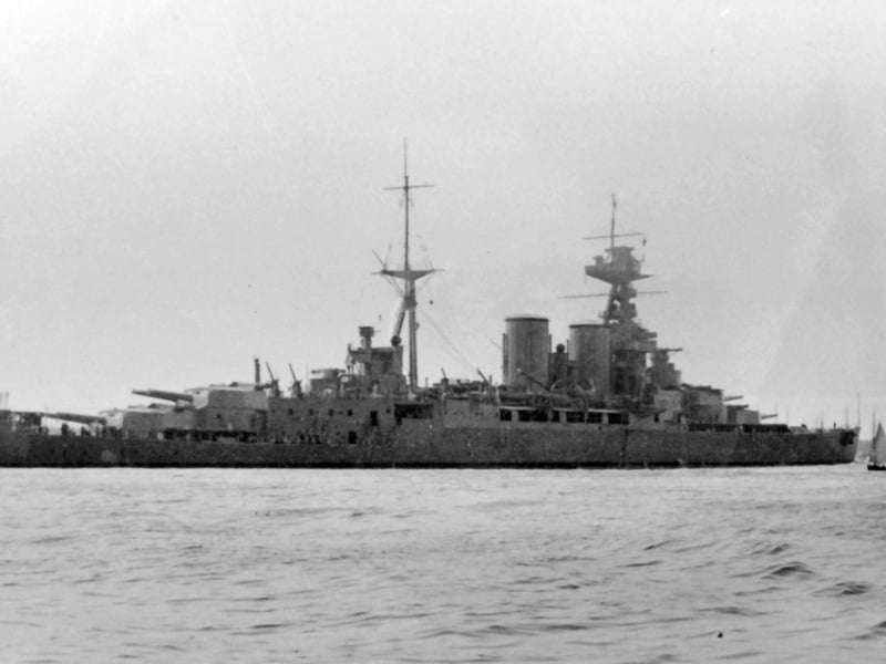 The largest warship in the world at her launch, HMS Hood was a powerful battlecruiser and a flagship of British naval prestige in the interwar years. Fast and heavily armed, she lacked adequate deck armour—a flaw that proved fatal in 1941. During the Battle of the Denmark Strait, she was struck by Bismarck and exploded with the loss of 1,415 crew, a national tragedy that deeply shocked Britain and spurred the relentless hunt for her killer.