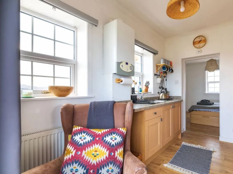 The kitchen of this quirky studio flat at Strathy Point Lighthouse in the Scottish Highlands, which is listed for sale for offers over £75,000. It was viewed more times during May 2025 than any other property for sale on Zoopla.