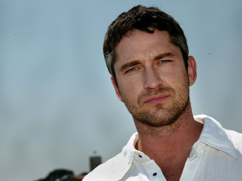 Gerard Butler carved out a distinct niche as a rugged action star with a commanding screen presence. His career-defining role as King Leonidas in 300 became an instant cultural phenomenon, generating countless memes and solidifying his tough-guy persona.