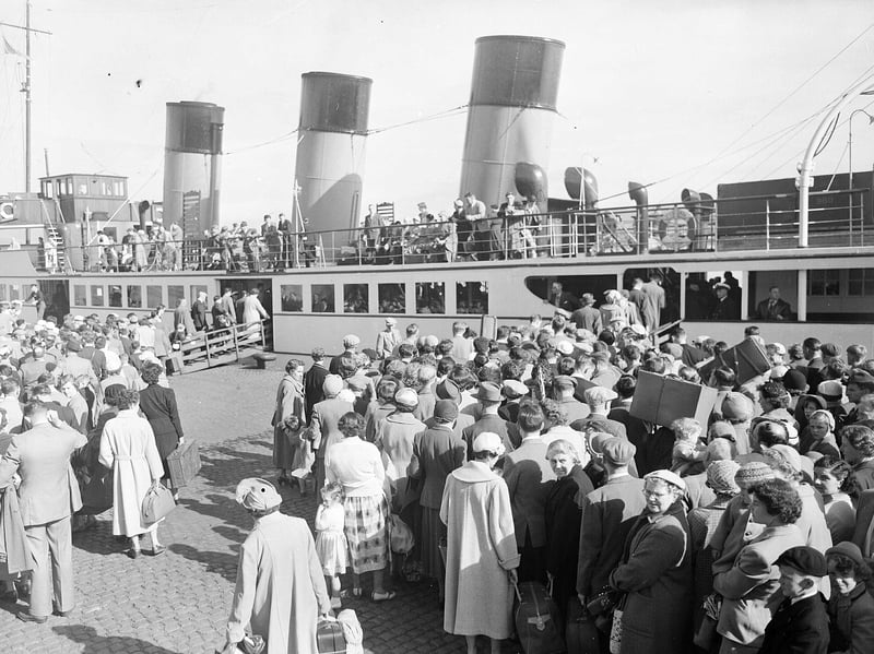 The Glasgow Fair holiday at Gourock, where people are seen boarding the Clyde Steamer, in July 1955