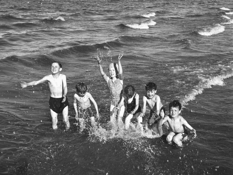 Children playing in the sea at Portobello in July 1966