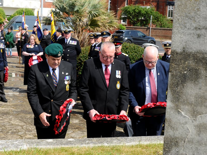 Wreaths being lad at the memorial stone