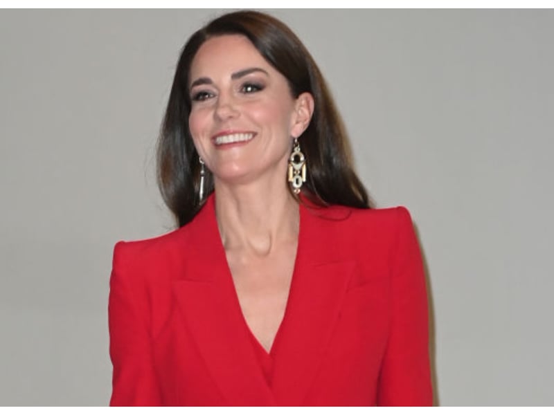 I adore the vibrancy of Catherine, Princess of Wales's red Alexander McQueen trouser suit she wore on January 30, 2023