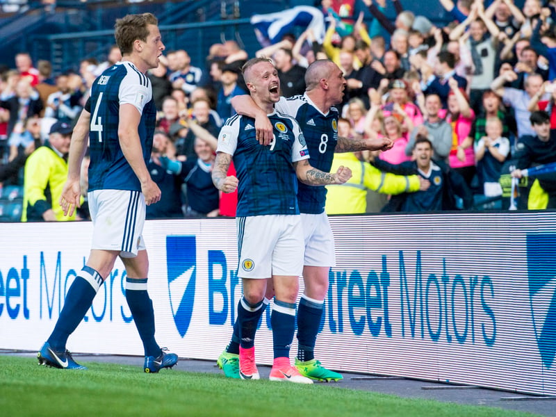 Scotland's Leigh Griffiths celebrates his second goal with the Hampden crowd.