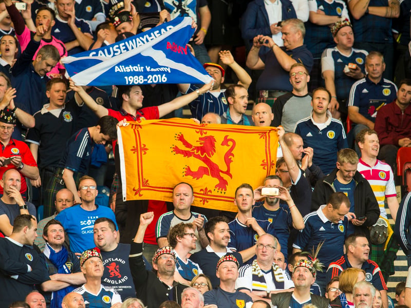 Scotland fans wave their flags during the game against England.