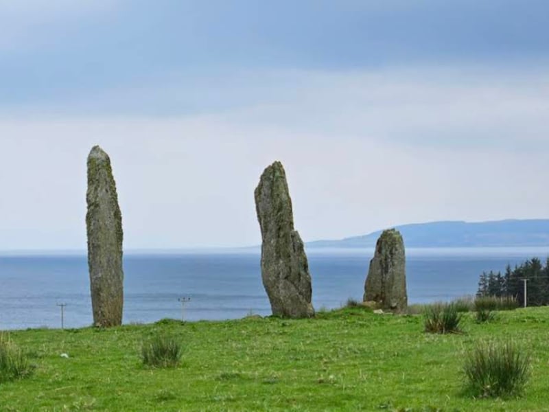 Located near the western shore of the Kintyre Peninsula, the Ballochroy stones are thought to be aligned with distant mountain peaks and possibly even midsummer sunsets. The three tall stones sit in a line with views across to the island of Jura, creating a natural observatory that links sky, sea and stone. It’s an ideal place for those seeking a raw, elemental Solstice experience. The stones form part of the scenic Kintyre 66 route, which loops around the peninsula and highlights its natural beauty and heritage. Nearby, you can explore the harbour town of Campbeltown, known for its distilleries and historic waterfront, or take a short ferry to the peaceful island of Gigha, home to white-sand beaches and views across to Islay and Jura. It’s a corner of Scotland where ancient landscapes and island calm come together.