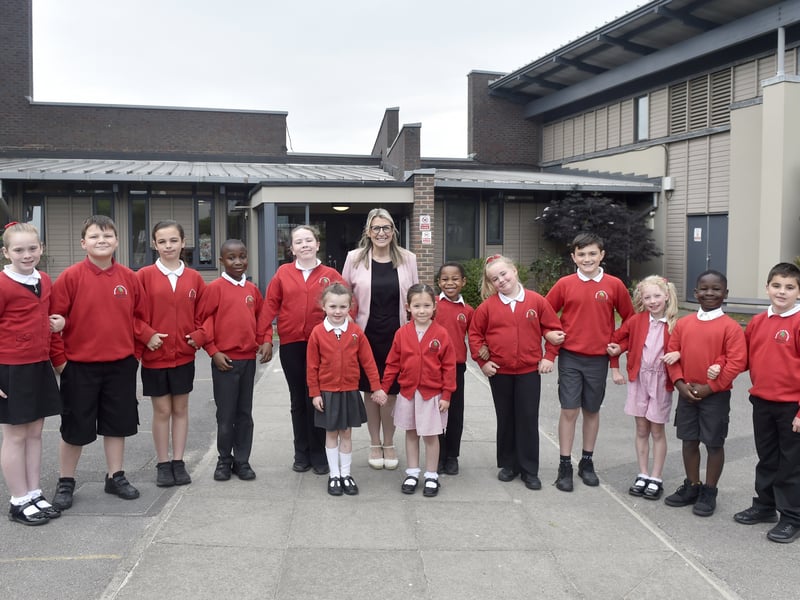 Newtown CofE Primary School in Queen's Road, Gosport, was rated good for behaviour and attitudes in the Ofsted report which was published on June 10. 

Pictured is: Headteacher Emma Howlett with just some of the children from the school.

Picture: Sarah Standing (120625-4496)