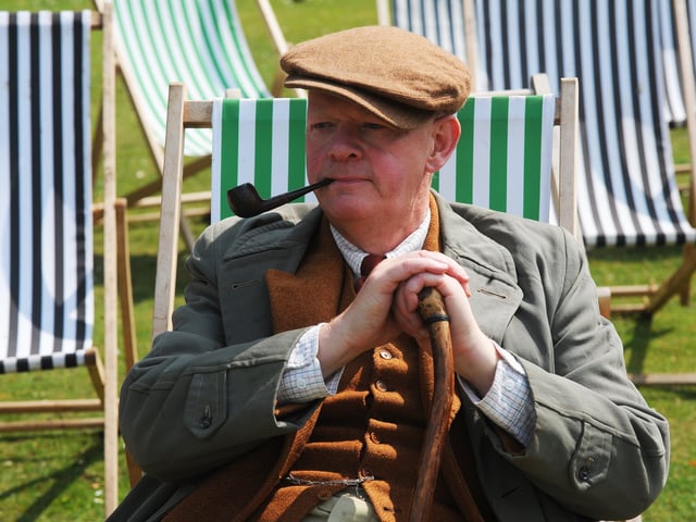 Colin Wright relaxed for a smoke as he watches the acts.