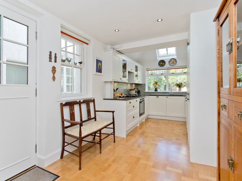 The kitchen comes very well appointed with a wide range of attractive, Shaker-inspired wall and base cabinets, spacious high-quality worktops, and splashback tiling. The room also has built-in storage, external access, and it provides space for a cosy snug or breakfasting area – perfect for morning coffee.
